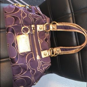 Purple and gold Coach purse